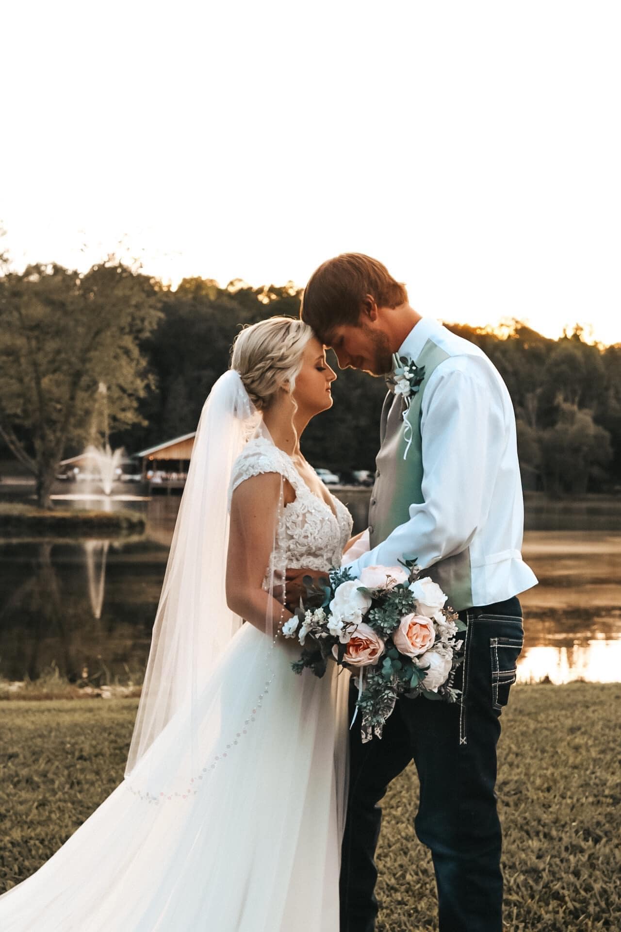bride and groom embrace