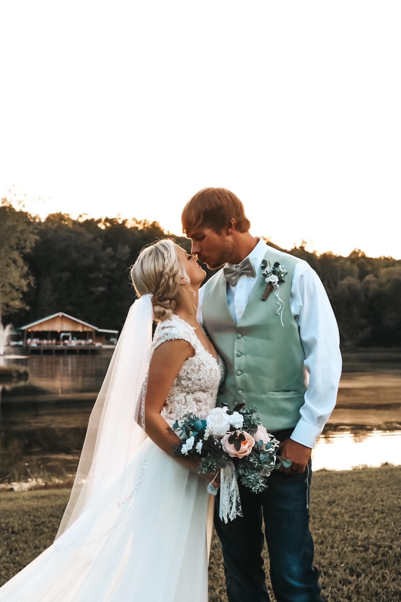 bride and groom kiss