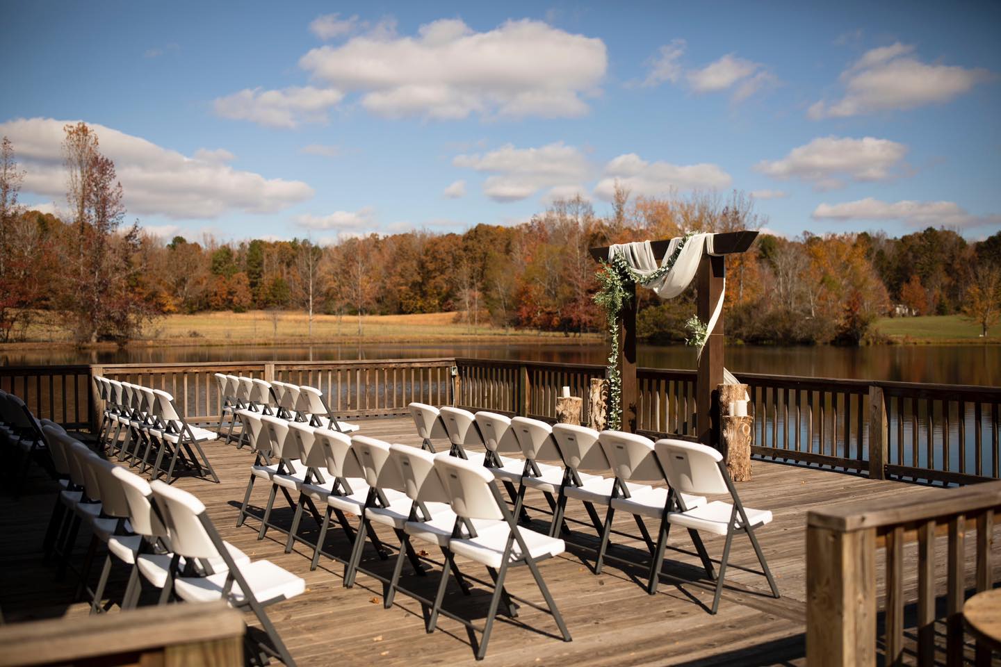 outdoor wedding venue ceremony deck overlooking lake
