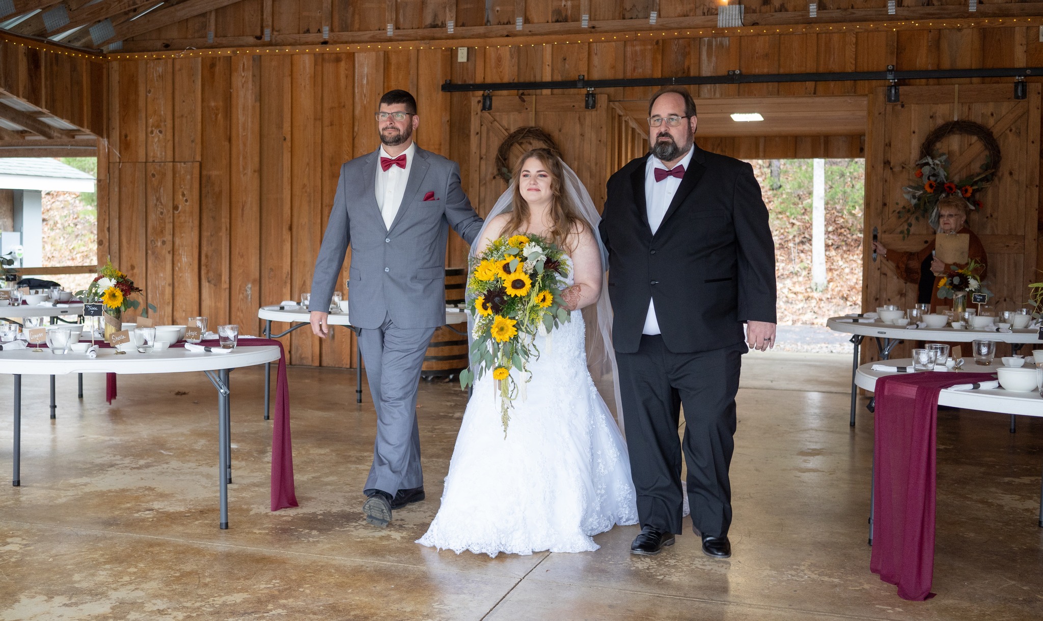 bride being walked down the aisle
