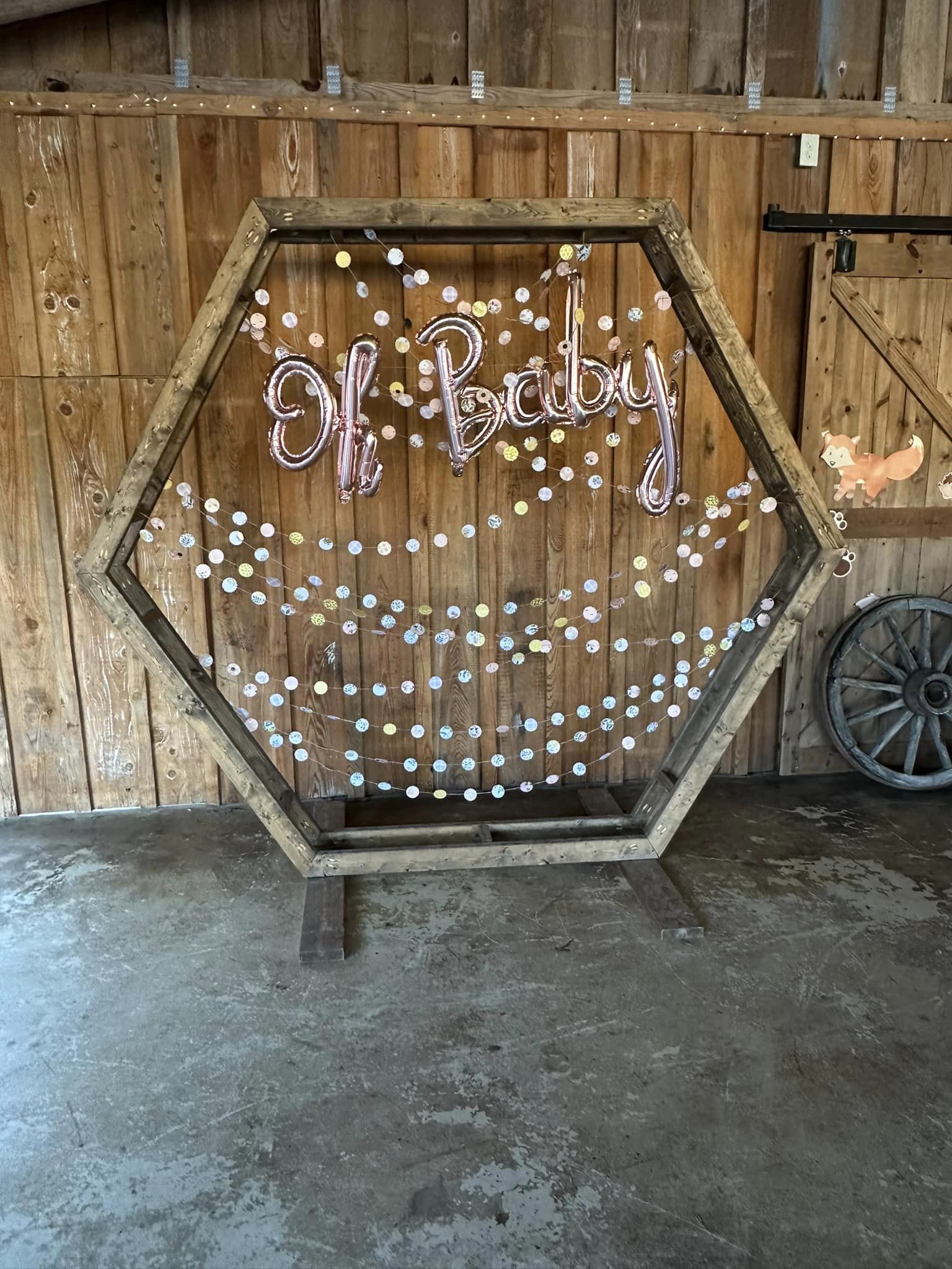 baby shower modern arch with balloons and sparkle garland