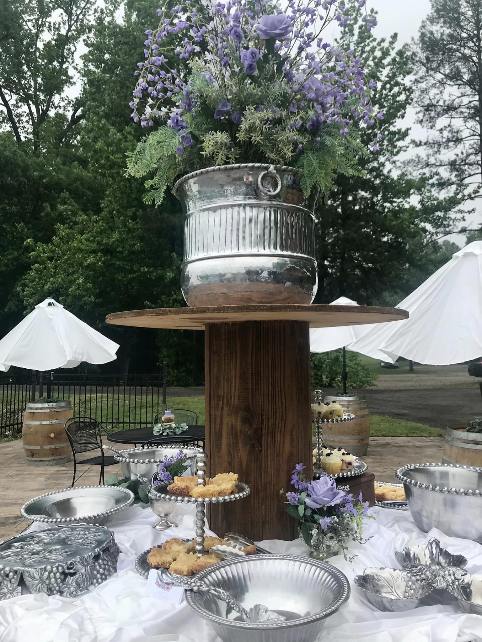 silver and purple themed desert serving table