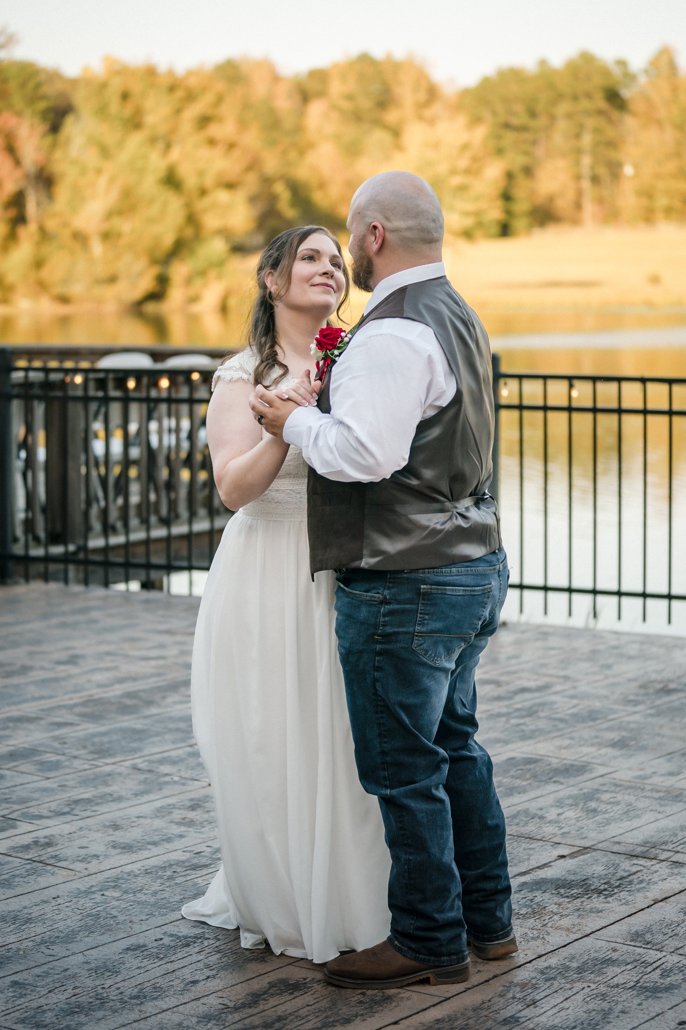 groom leading bride around dance floor